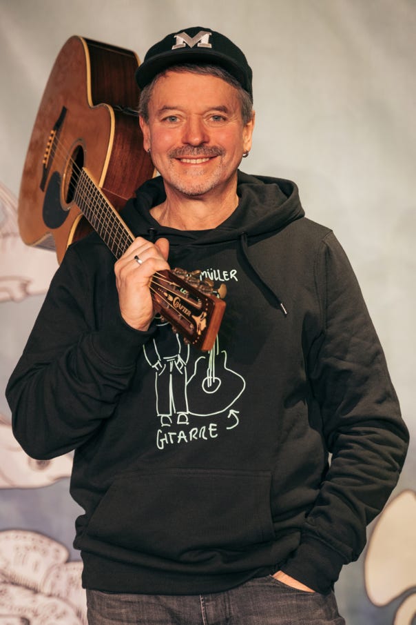 Herr Müller und seine Gitarre